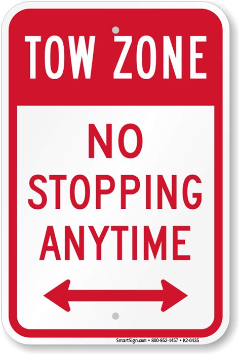 no standings|no stopping zone sign.